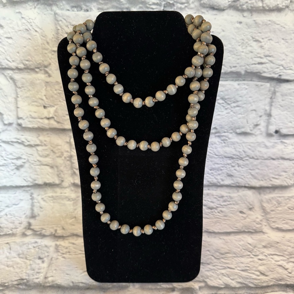 Gray beaded necklace.